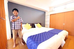 Letto o letti in una camera di Chura Minpaku Ishigaki