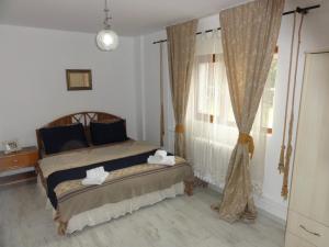 Katil atau katil-katil dalam bilik di Evodak Apartment