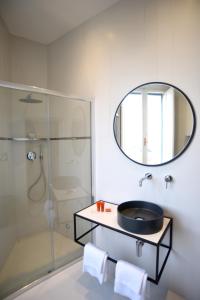 Ett badrum på Suite Calderini