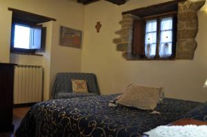 Ein Bett oder Betten in einem Zimmer der Unterkunft Selvadonica