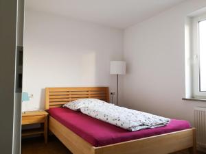 Ein Bett oder Betten in einem Zimmer der Unterkunft Focus Bodensee