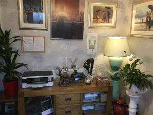 A kitchen or kitchenette at Alltonside Guest House 