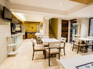 Kuchyň nebo kuchyňský kout v ubytování Hotel Bawa Continental