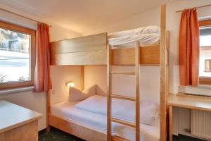 Ein Bett oder Betten in einem Zimmer der Unterkunft Hotel Bergkranz