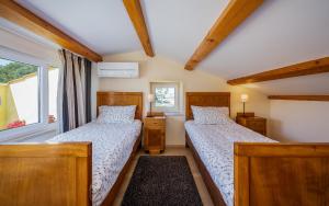 Postel nebo postele na pokoji v ubytování Apartment Lungomare
