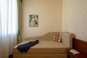 Cama o camas de una habitación en Hotel Boccaccio