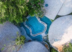 Bazén v ubytování Kundala Beach Resort Hua Hin nebo v jeho okolí