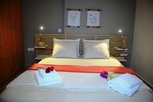 A bed or beds in a room at Myrto2 apartment