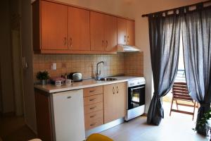 A kitchen or kitchenette at Myrto2 apartment
