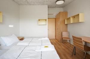 Ein Bett oder Betten in einem Zimmer der Unterkunft Hotel Edda Egilsstadir