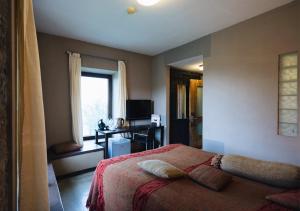 TV a/nebo společenská místnost v ubytování Tufenkian Avan Marak Tsapatagh Hotel