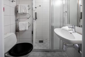 Ett badrum på First Hotel Royal