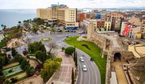 an aerial view of a city with a street at Roman Circus views Apartment in Tarragona