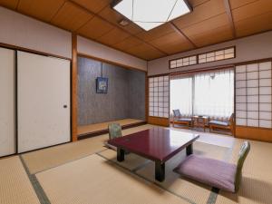 Posezení v ubytování Awara Onsen Minoya Taiheikaku