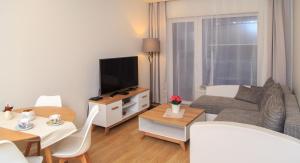 Гостиная зона в VIP apartaments - Zalgirio 96