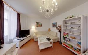 TV a/nebo společenská místnost v ubytování Apartmány Tábor