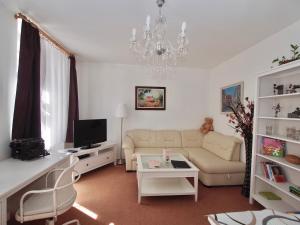 TV a/nebo společenská místnost v ubytování Apartmány Tábor