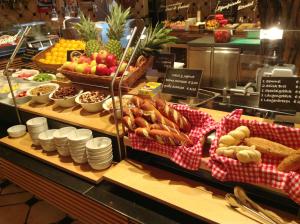 a display case in a store filled with lots of food at Rosenberger Motel Völkermarkt in Völkermarkt