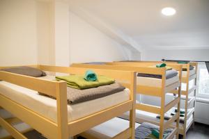 Ένα ή περισσότερα κρεβάτια σε δωμάτιο στο Wine Hill Hostel