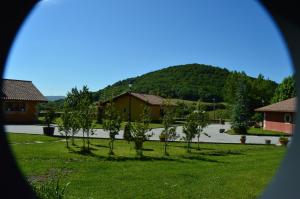 a view of a village with a mountain in the background at CASUCAS LA GUARIZA - Casa Susi - in Fontibre +15 photos