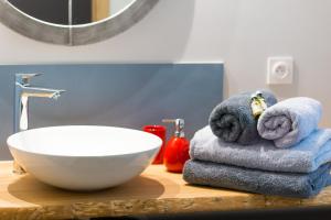 Et badeværelse på L'Attrap'Rêves : Le confort Hôtelier, la convivialité en plus