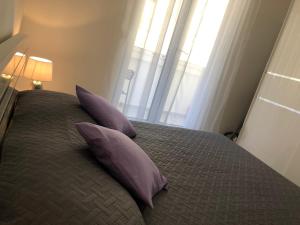 Posteľ alebo postele v izbe v ubytovaní Marea Apartments