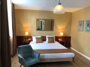 Voodi või voodid majutusasutuse Hotel Johannes Vermeer Delft toas