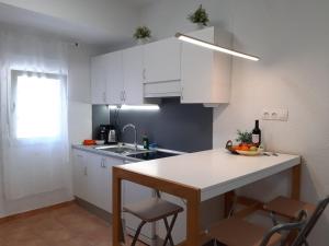 Kjøkken eller kjøkkenkrok på Apartamentos El Tosal 7E
