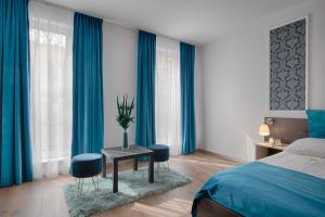 Posteľ alebo postele v izbe v ubytovaní Triple M Hotel