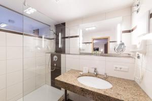 Koupelna v ubytování Hotel Garni Vier Jahreszeiten