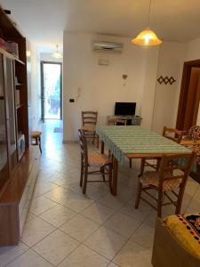 TV a/nebo společenská místnost v ubytování Torre Lapillo