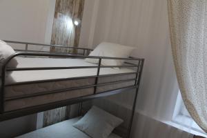 Posteľ alebo postele v izbe v ubytovaní Lorf Hostel&Coffee
