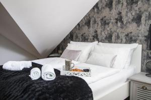 Postel nebo postele na pokoji v ubytování Note Luxury Apartments