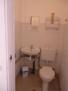 Ванная комната в Villa Jun Guest House