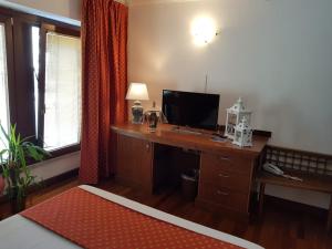 TV a/nebo společenská místnost v ubytování HR Hotel