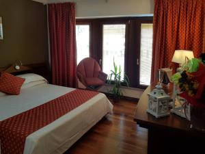 Postel nebo postele na pokoji v ubytování HR Hotel