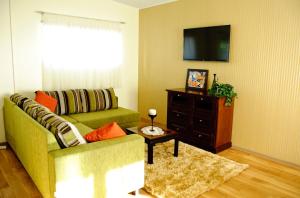 TV/trung tâm giải trí tại Embrace Hotel & Apartments