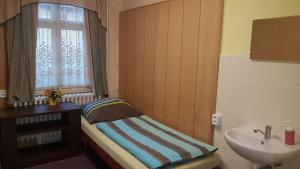Posteľ alebo postele v izbe v ubytovaní Hostel Fortuna