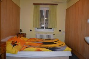 Posteľ alebo postele v izbe v ubytovaní Hostel Fortuna
