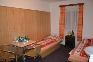 Posteľ alebo postele v izbe v ubytovaní Hostel Fortuna