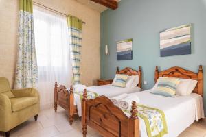Postel nebo postele na pokoji v ubytování Twilight Holiday Home + 37 fotografií