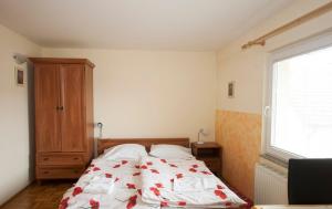 Postel nebo postele na pokoji v ubytování Guest House Čelan