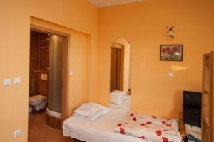 Postel nebo postele na pokoji v ubytování Guest House Čelan