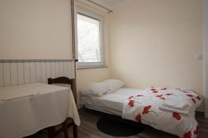 Postel nebo postele na pokoji v ubytování Guest House Čelan