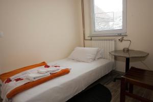 Postel nebo postele na pokoji v ubytování Guest House Čelan