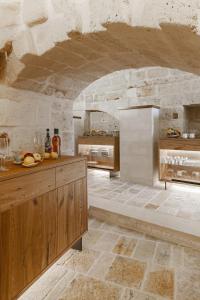 Kuchyň nebo kuchyňský kout v ubytování Cenobio Hotel & SPA Matera