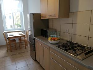 Kuchyňa alebo kuchynka v ubytovaní Apartament Miarki