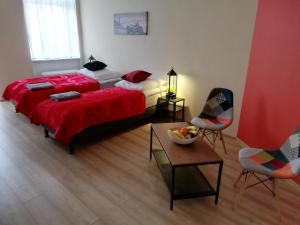Posteľ alebo postele v izbe v ubytovaní Apartament Miarki