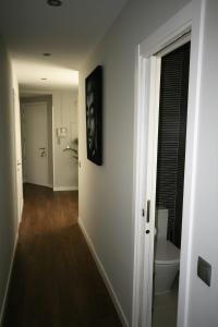 an empty hallway with a toilet in a room at Madrid Top View in Madrid