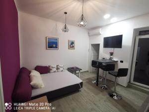 Μια τηλεόραση ή/και κέντρο ψυχαγωγίας στο Apartment Toni
